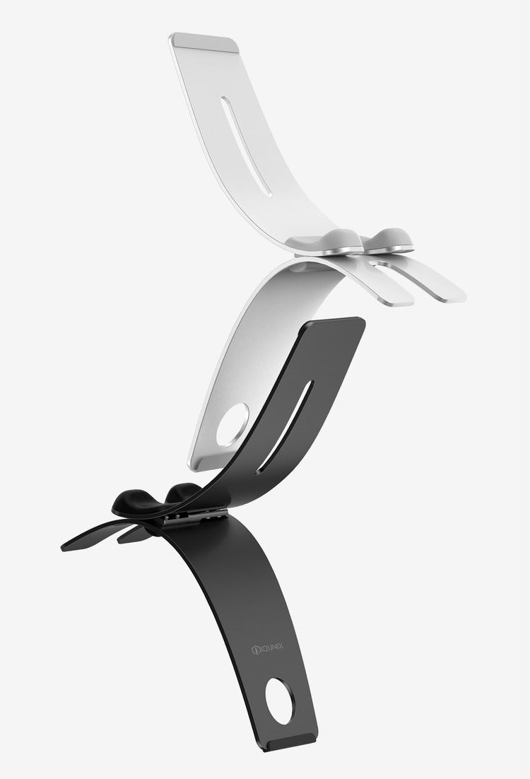a black and white object with a black clip