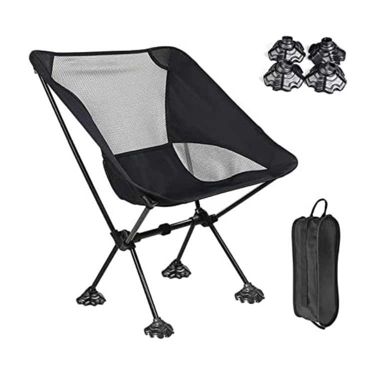 a black folding chair with a bag and two black objects