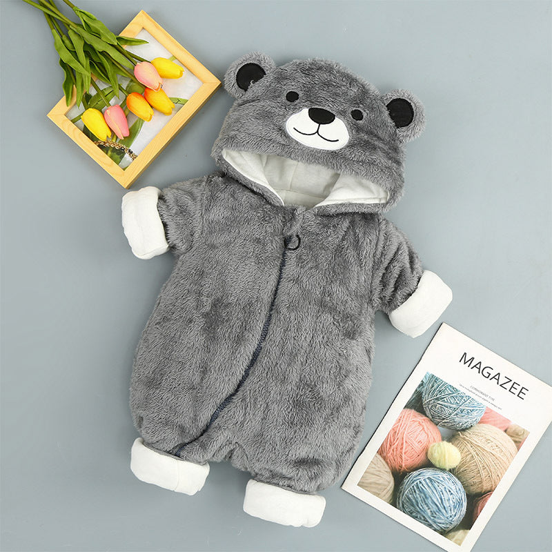 a grey bear garment with a picture of flowers and a magazine