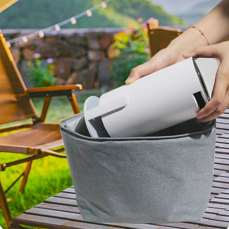 a hand holding a white container
