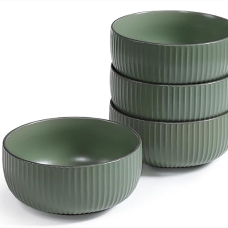 a stack of bowls on a white background